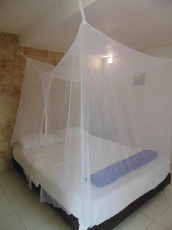 Una cama o camas en una habitación de Dunarinka
