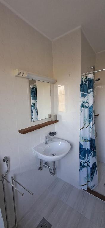 Koupelna v ubytování Oleander Rooms
