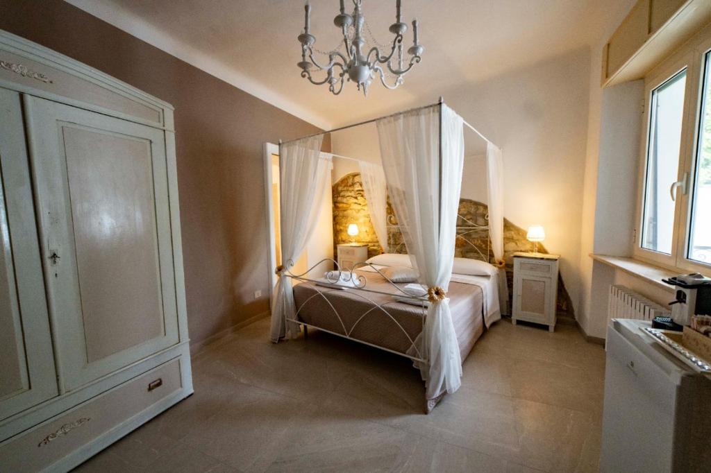Postel nebo postele na pokoji v ubytování Suite Petra