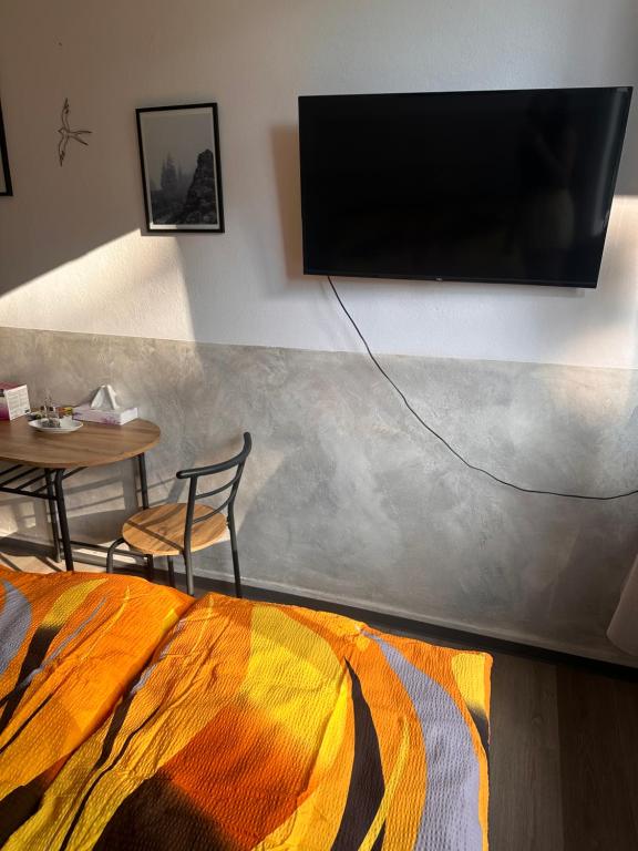 TV a/nebo společenská místnost v ubytování Apartmán Sedmička