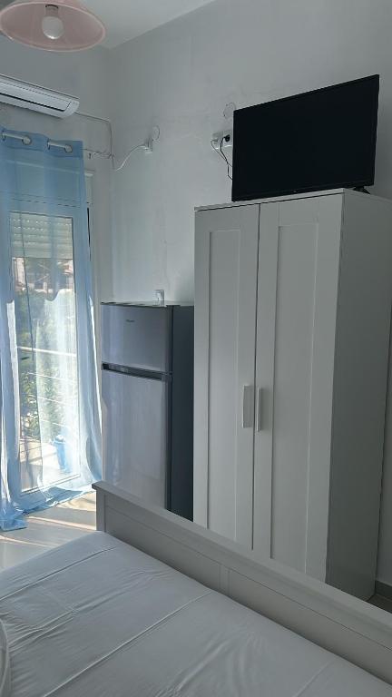 Postel nebo postele na pokoji v ubytování Mimika studios
