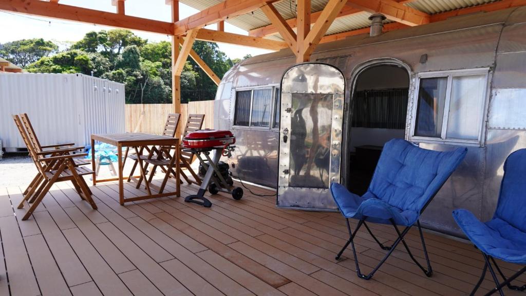a deck with chairs and a grill and a trailer at CAMP & BEER BEERBELLY ISESHIMA - Vacation STAY 82905v in Shima