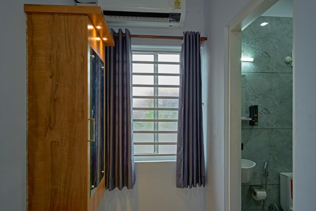 Koupelna v ubytování Panakal Residency, Fort Kochi