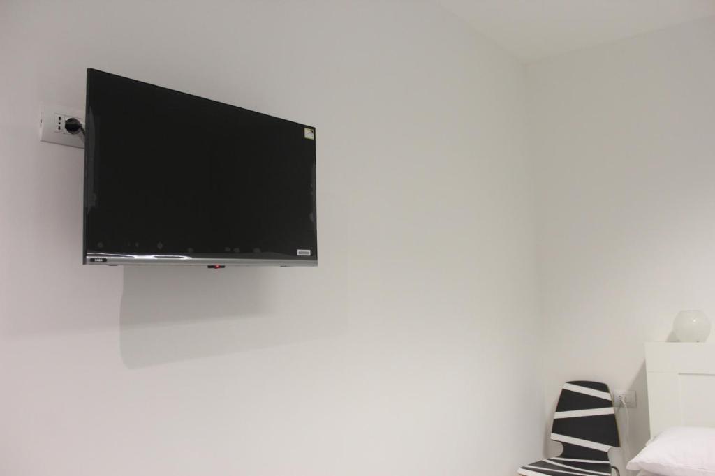 TV a/nebo společenská místnost v ubytování SG Rooms
