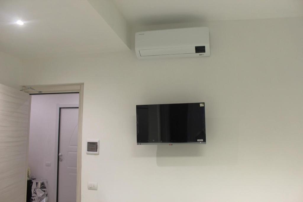 TV a/nebo společenská místnost v ubytování SG Rooms