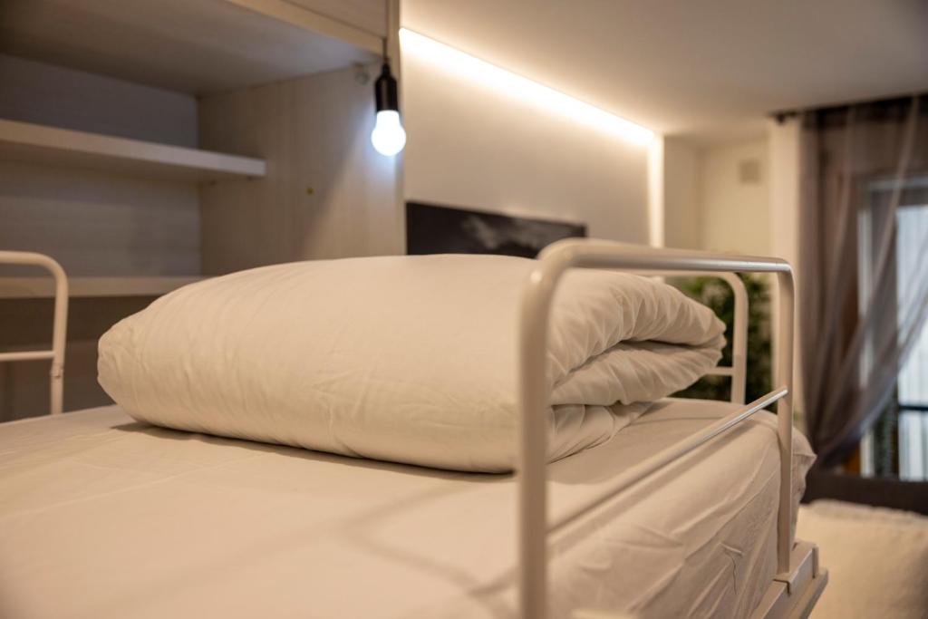 Postel nebo postele na pokoji v ubytování Estudio Para Grupos Pequeños en El Pas De La Casa - Céntrico