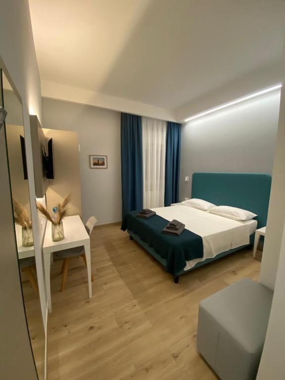 Postel nebo postele na pokoji v ubytování Fla Rooms