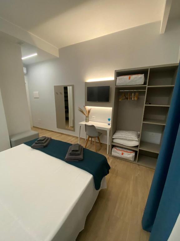 Postel nebo postele na pokoji v ubytování Fla Rooms