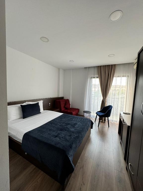 Postel nebo postele na pokoji v ubytování Hotel Real