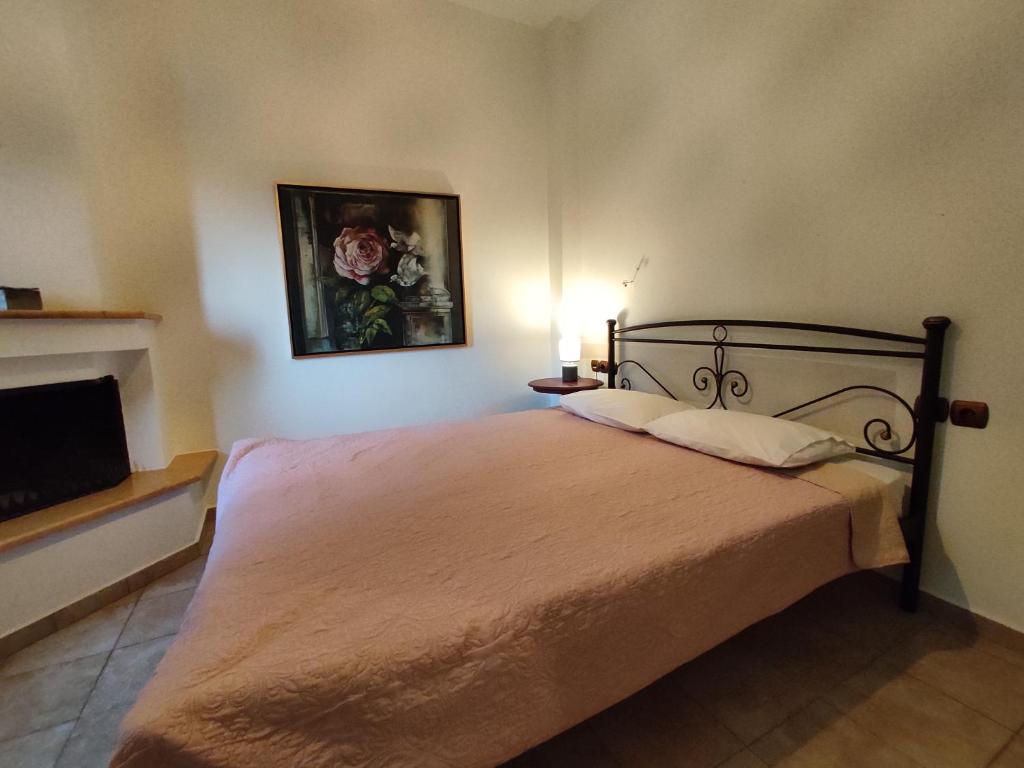 Postel nebo postele na pokoji v ubytování Miression Pelion House