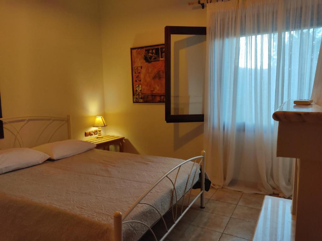 Postel nebo postele na pokoji v ubytování Miression Pelion House