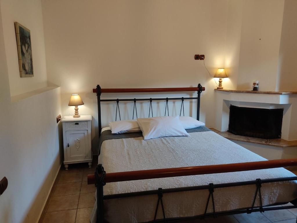 Postel nebo postele na pokoji v ubytování Miression Pelion House