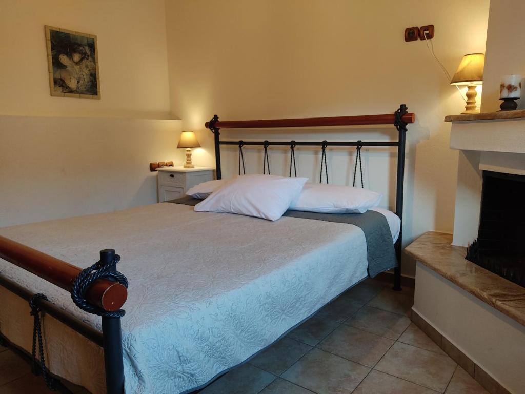 Postel nebo postele na pokoji v ubytování Miression Pelion House