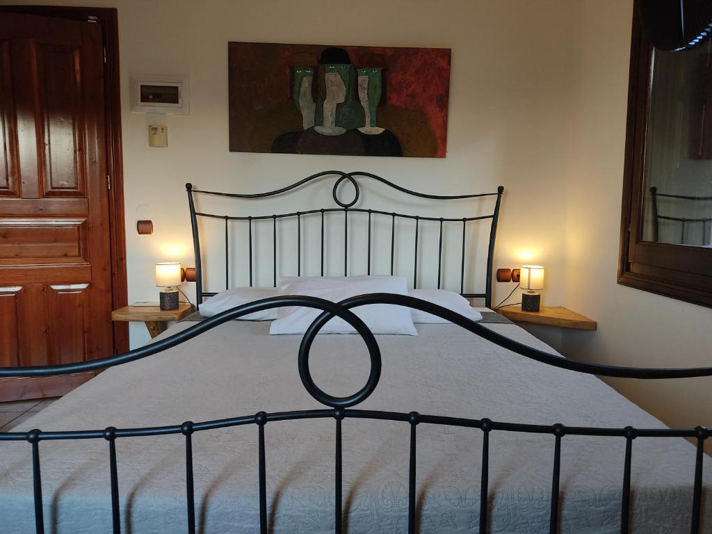 Postel nebo postele na pokoji v ubytování Miression Pelion House