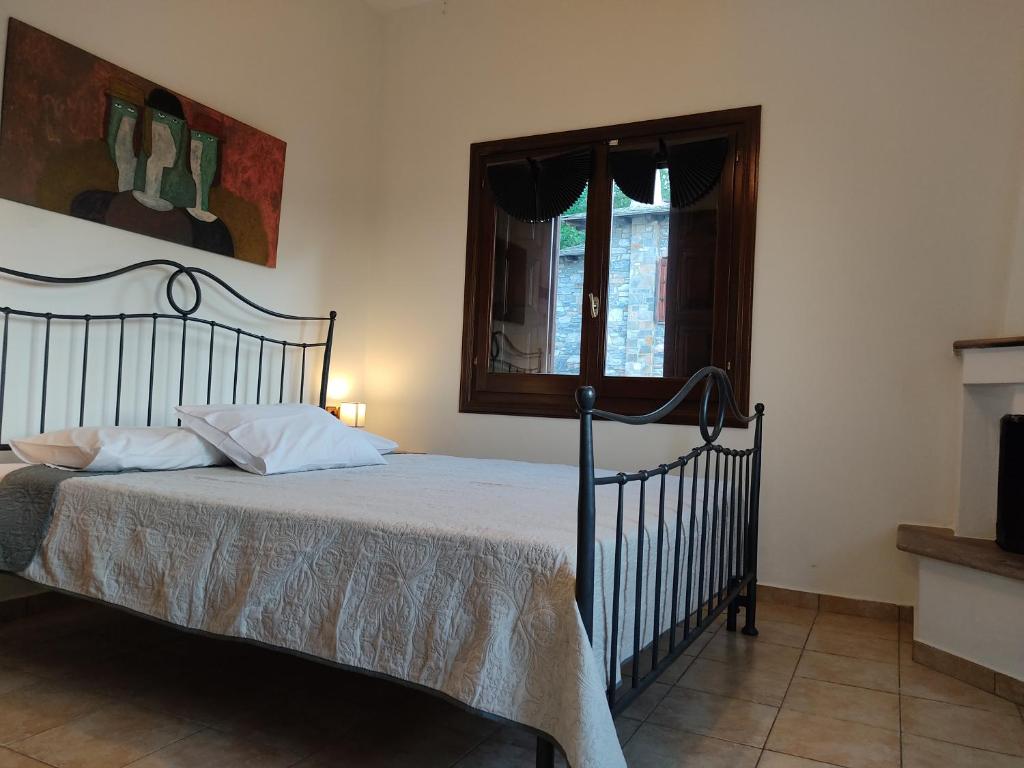 Postel nebo postele na pokoji v ubytování Miression Pelion House