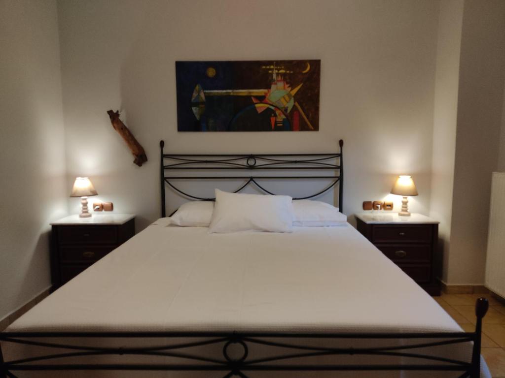 Postel nebo postele na pokoji v ubytování Miression Pelion House
