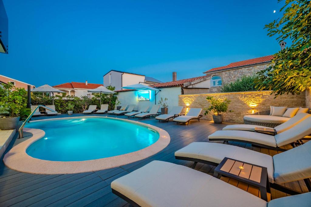 Bazén v ubytovaní Luxury Apartments VilaMaloca alebo v jeho blízkosti