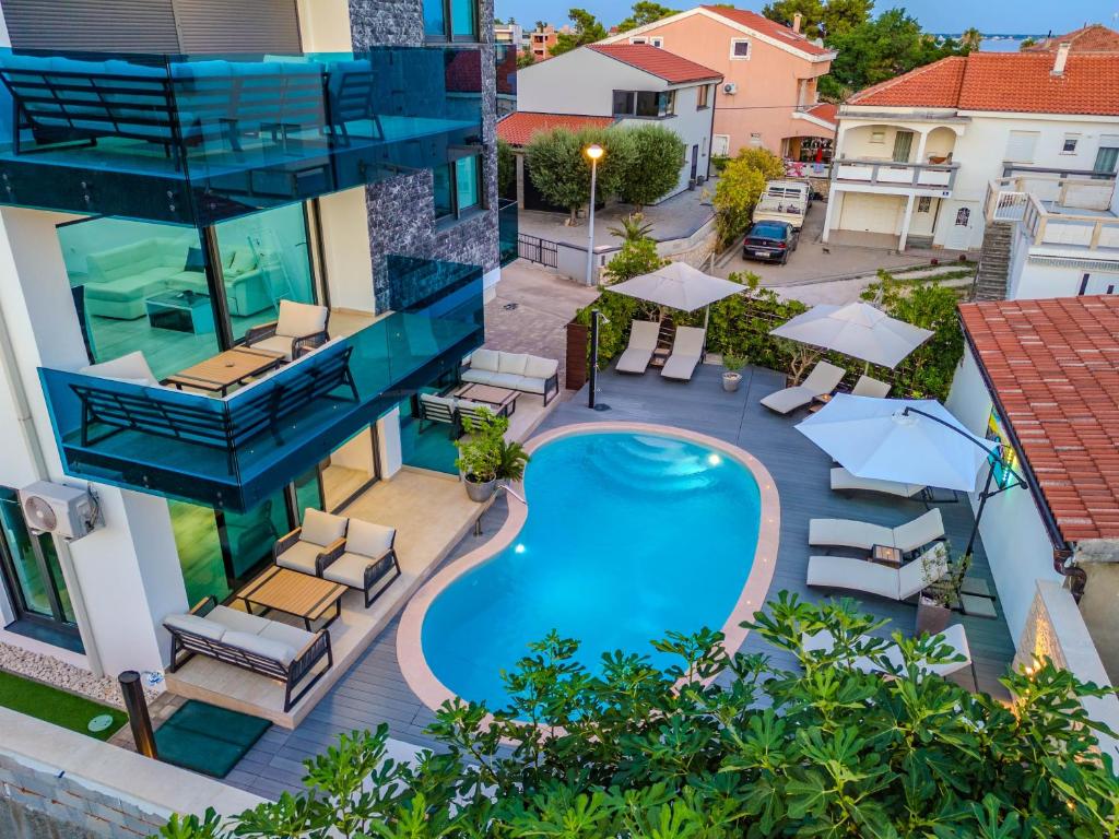 Bazén v ubytovaní Luxury Apartments VilaMaloca alebo v jeho blízkosti