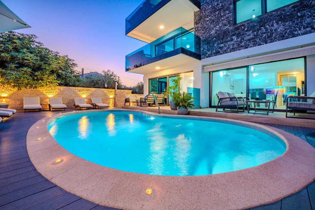 Bazén v ubytovaní Luxury Apartments VilaMaloca alebo v jeho blízkosti