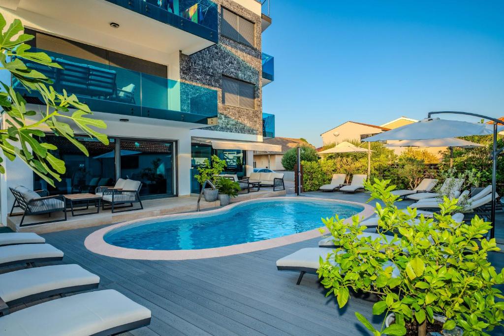Bazén v ubytovaní Luxury Apartments VilaMaloca alebo v jeho blízkosti