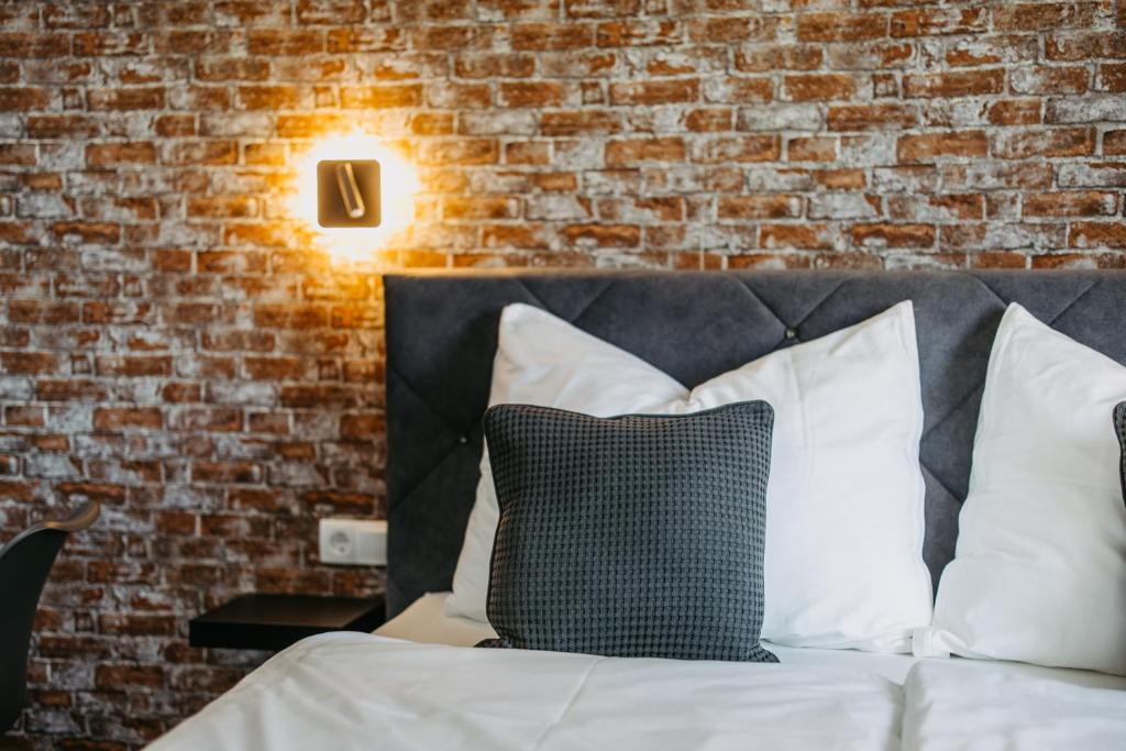 Postel nebo postele na pokoji v ubytování Loft Schottenau