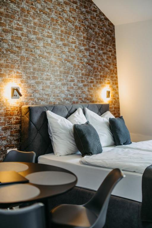 Postel nebo postele na pokoji v ubytování Loft Schottenau