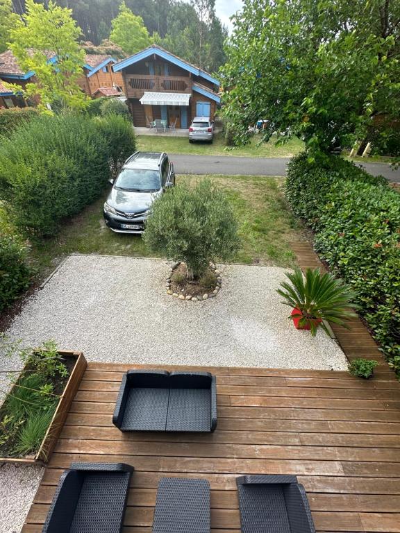 Zahrada ubytování COTTAGE ENTRE CONTIS ET MIMIZAN PLAGE - Piscine chauffée et balnéothérapie