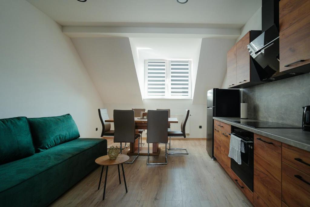 Kuchyň nebo kuchyňský kout v ubytování Enjoy apartments