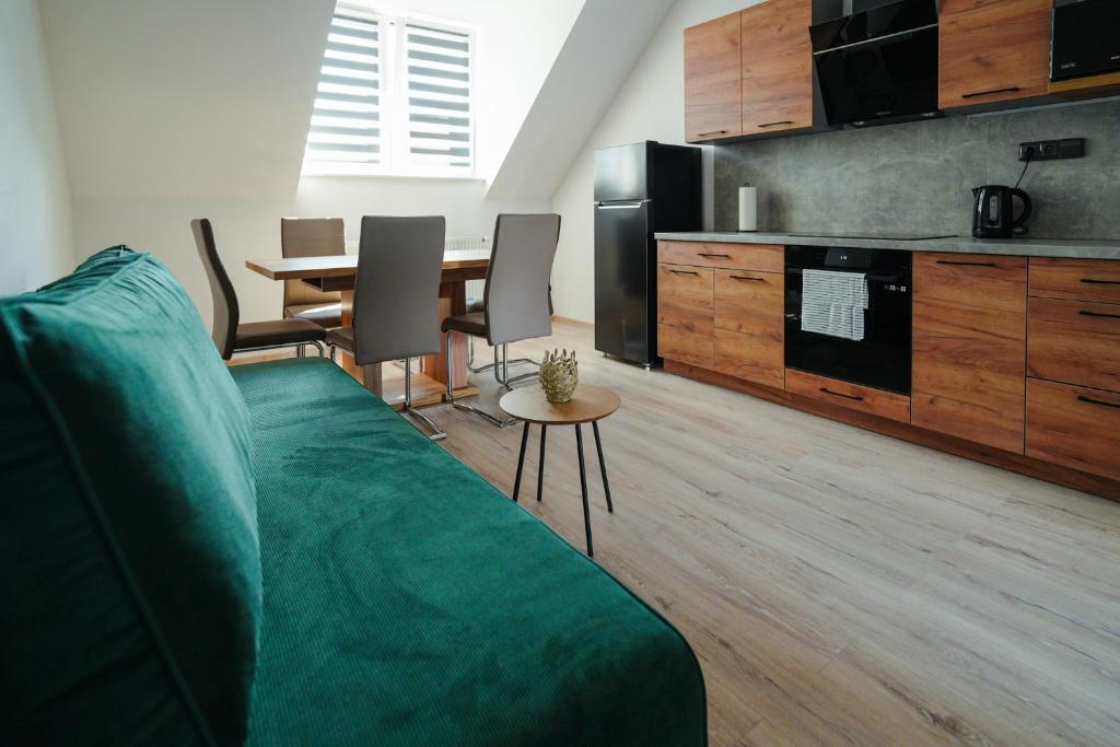Kuchyň nebo kuchyňský kout v ubytování Enjoy apartments