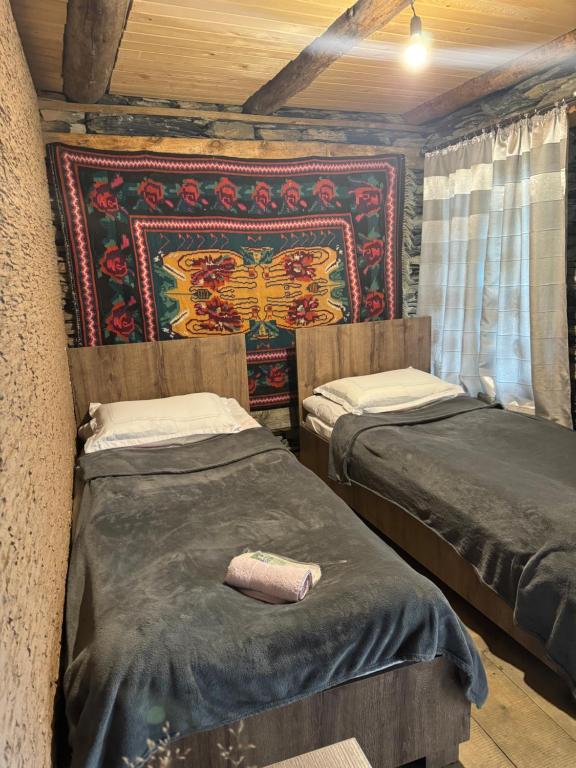 Postel nebo postele na pokoji v ubytování Pirikiti chesho