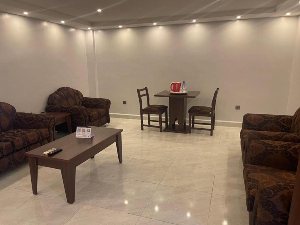 Posezení v ubytování Tahir Guest Palace Suites