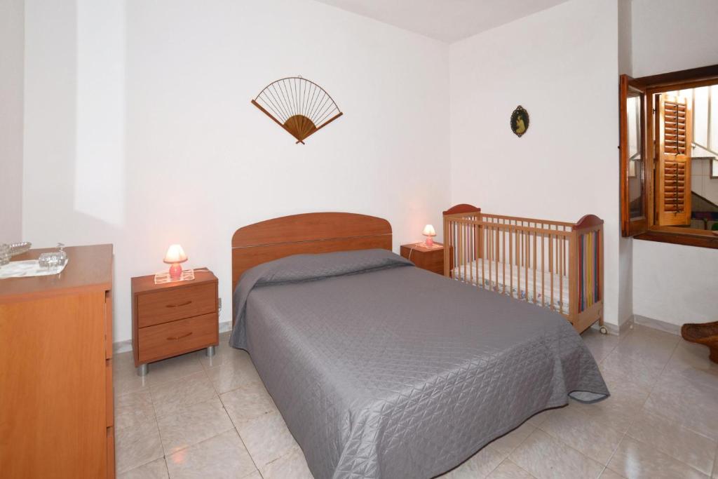 Łóżko lub łóżka w pokoju w obiekcie Casa Apara- Happy Rentals