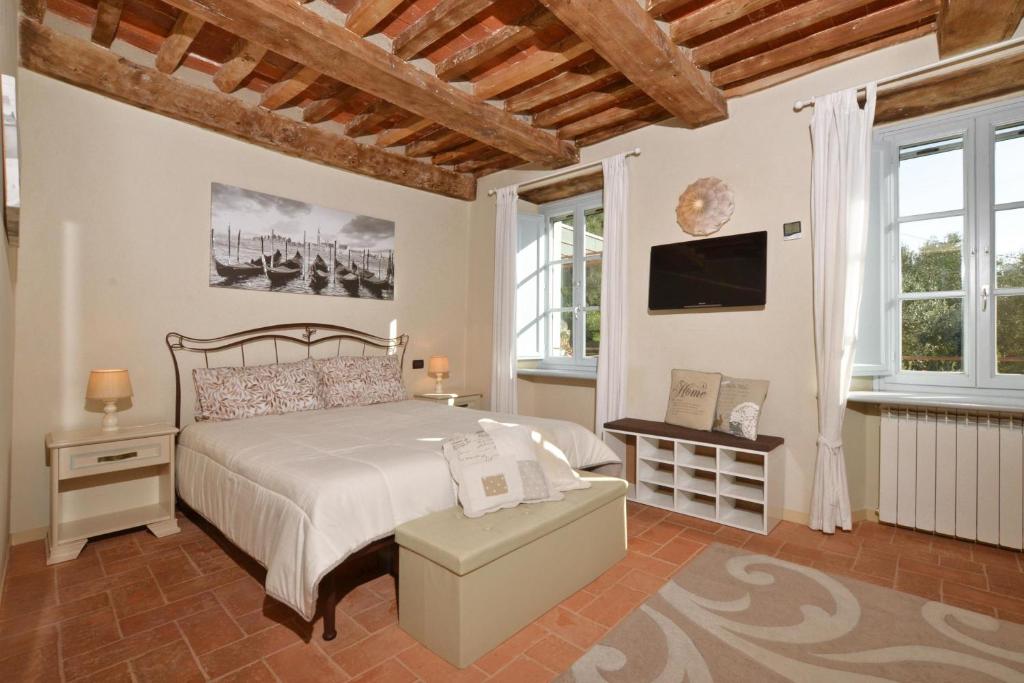 Postel nebo postele na pokoji v ubytování Alloro Grillo - Happy Rentals