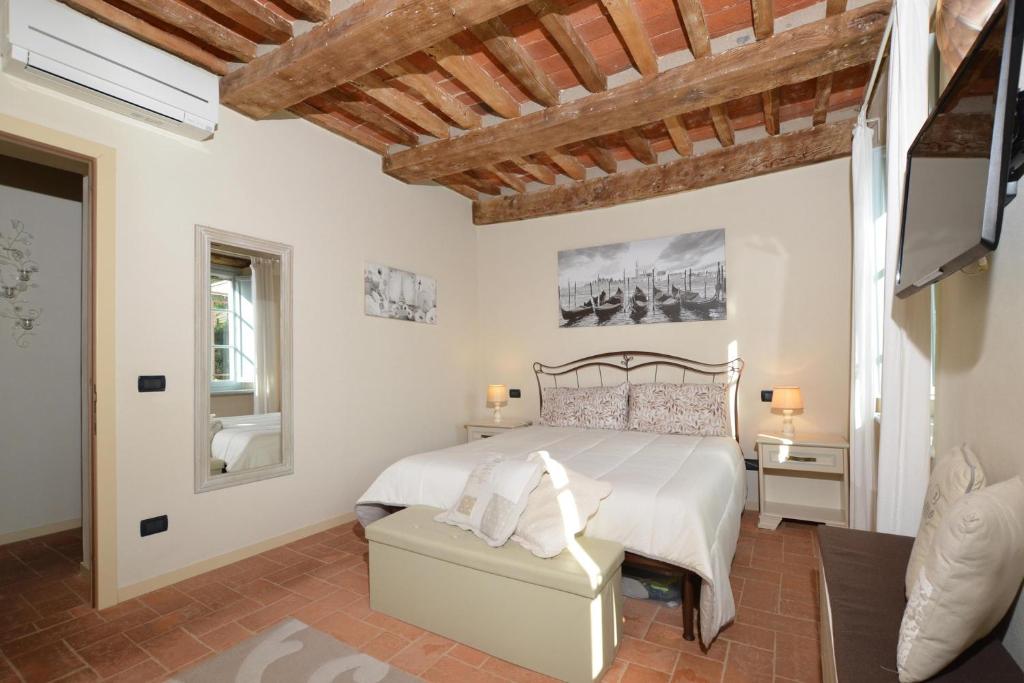Postel nebo postele na pokoji v ubytování Alloro Grillo - Happy Rentals