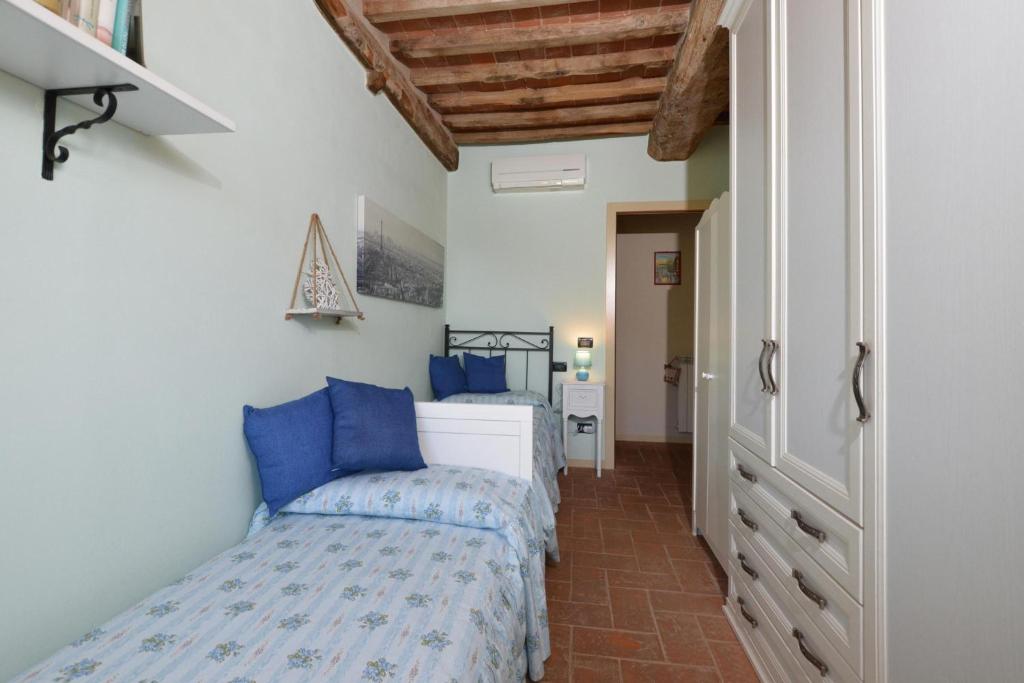 Postel nebo postele na pokoji v ubytování Alloro Grillo - Happy Rentals
