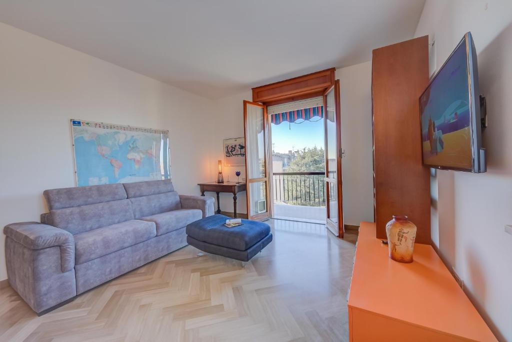 A television and/or entertainment centre at Casa di Paola - Happy Rentals