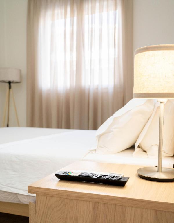 Postel nebo postele na pokoji v ubytování G&G Apartment