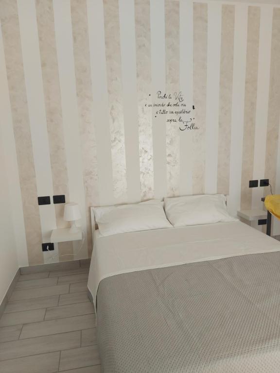 Postel nebo postele na pokoji v ubytování A casa di Adua