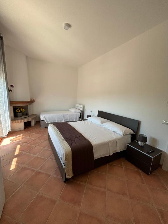 Postel nebo postele na pokoji v ubytování I Borghetti