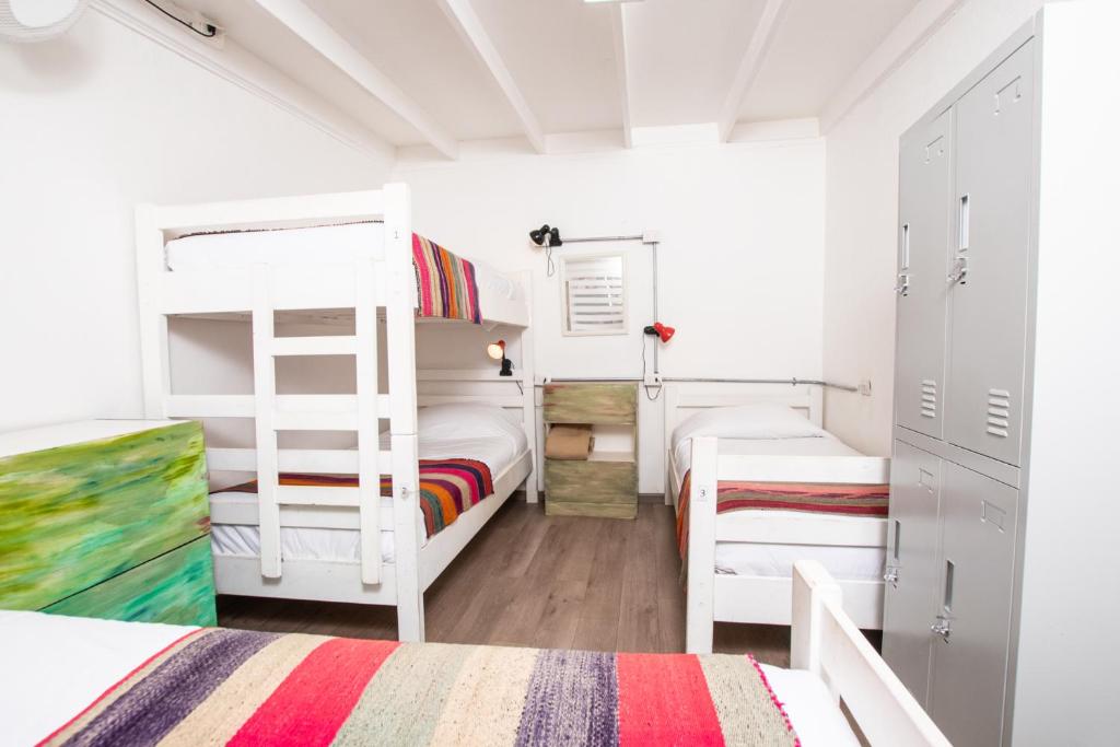 Postel nebo postele na pokoji v ubytování Hostal Copart