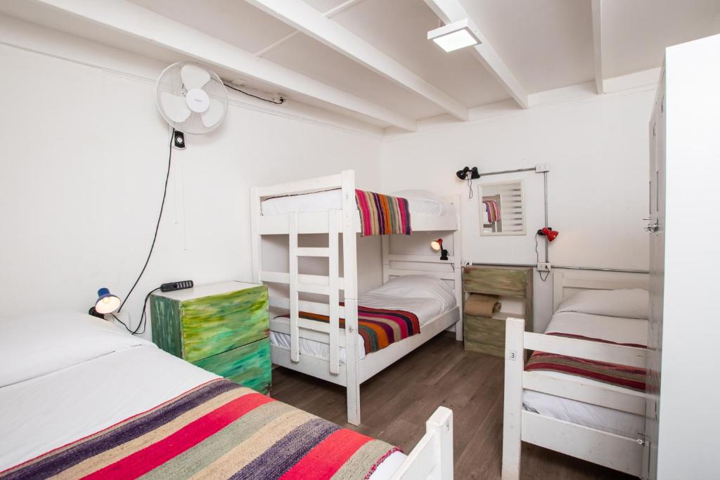 Postel nebo postele na pokoji v ubytování Hostal Copart