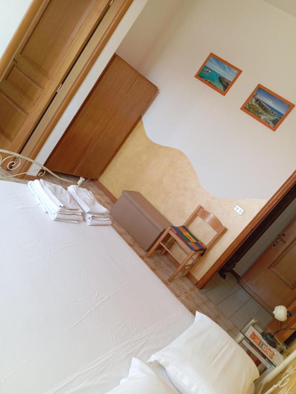 Postel nebo postele na pokoji v ubytování B&B Il Cedro