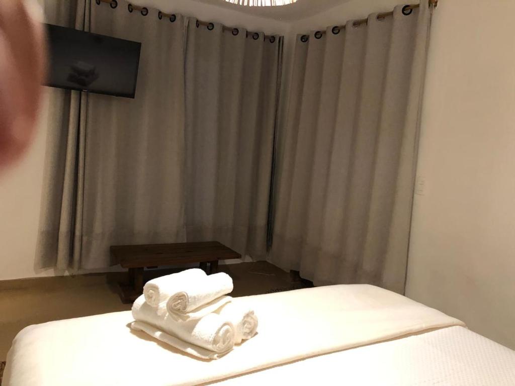 Postel nebo postele na pokoji v ubytování Casa Ocean Trancoso
