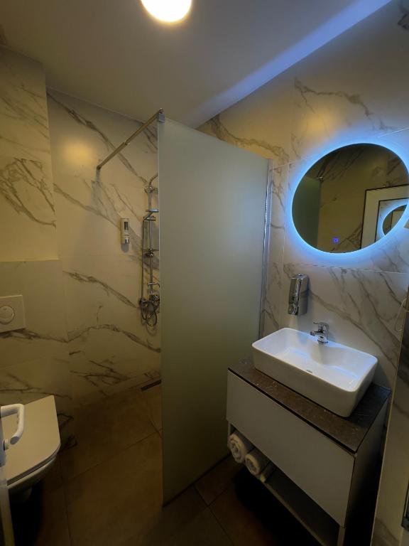 Koupelna v ubytování Hotel Real