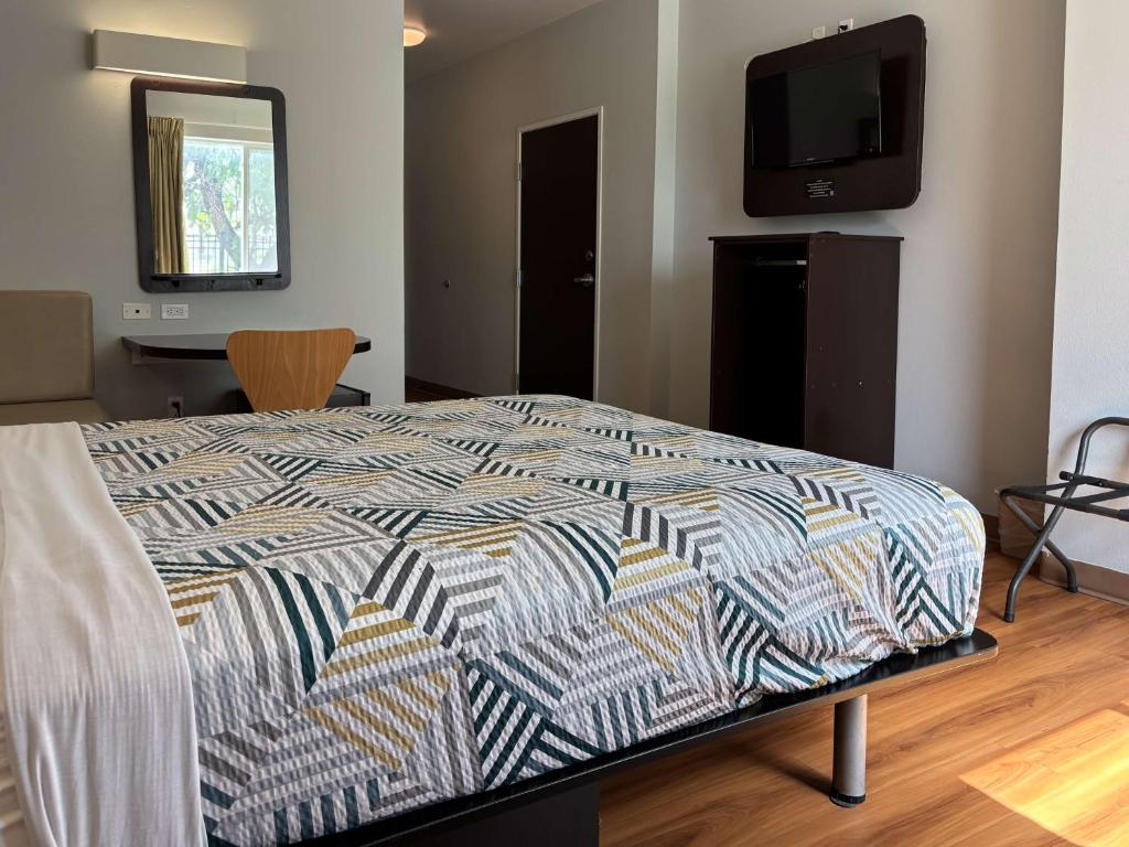 TV a/nebo společenská místnost v ubytování Motel 6-Weslaco, TX