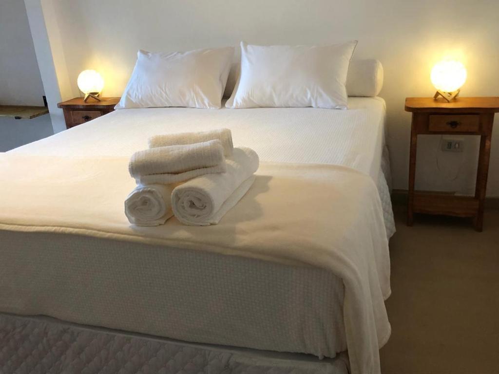 Postel nebo postele na pokoji v ubytování Casa Ocean Trancoso