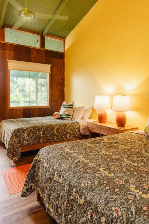 Postel nebo postele na pokoji v ubytování Mawamba Lodge