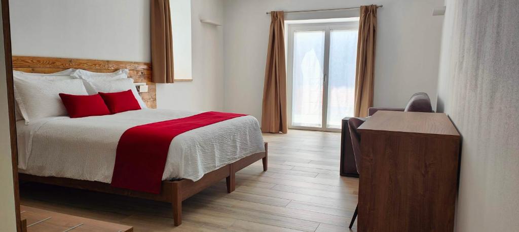 Postel nebo postele na pokoji v ubytování Casa NovecentoSei