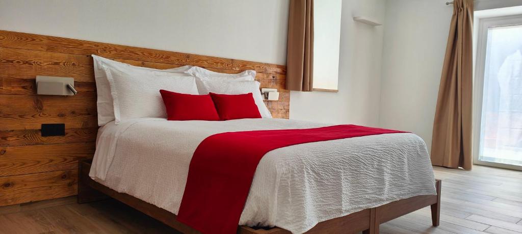 Postel nebo postele na pokoji v ubytování Casa NovecentoSei