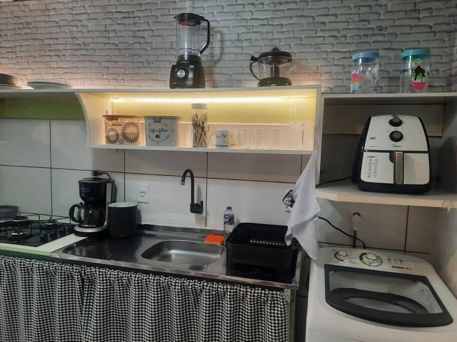 Kuchyň nebo kuchyňský kout v ubytování Apartamento Container com pátio, vaga para carro e Split